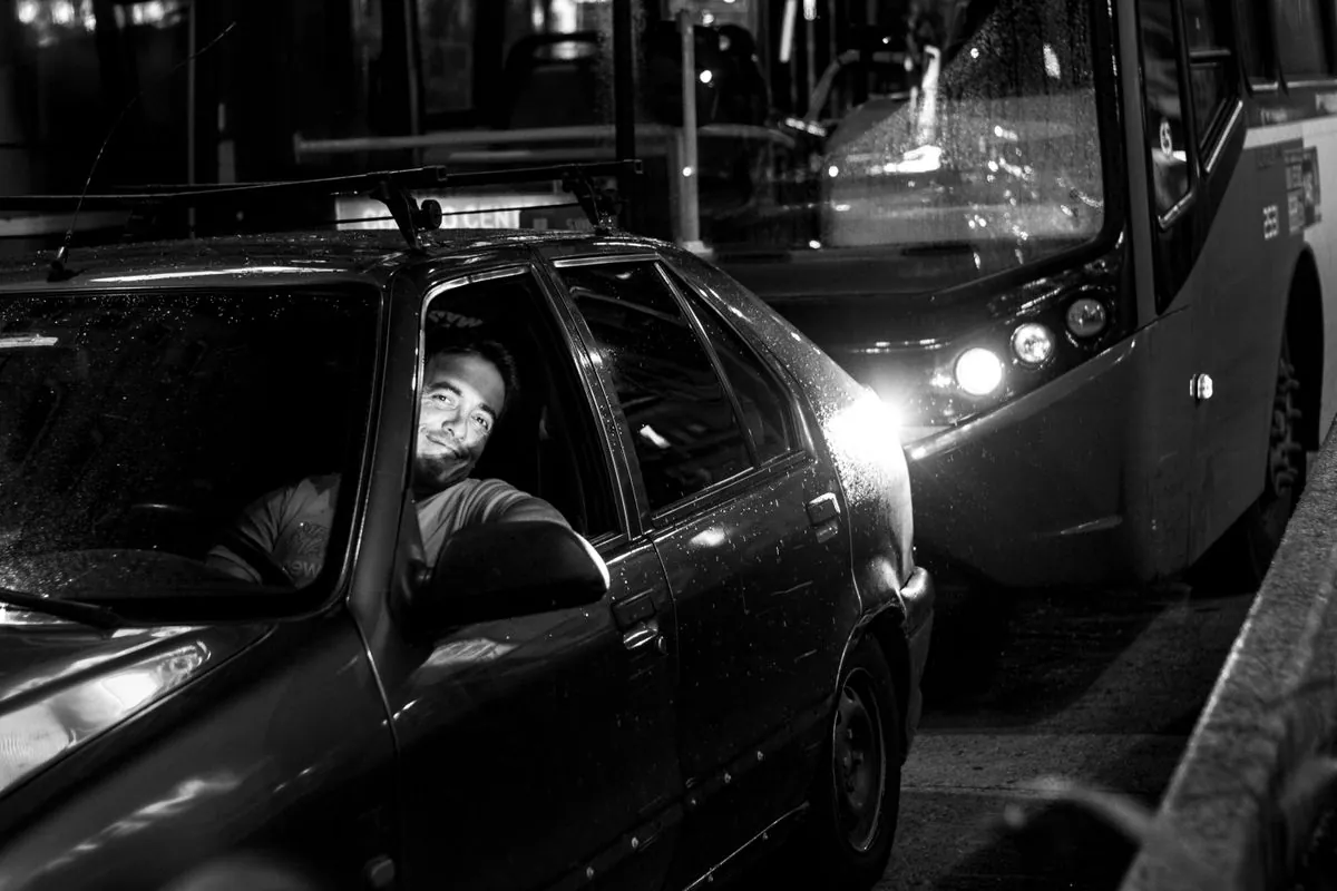 A dark car on a city street